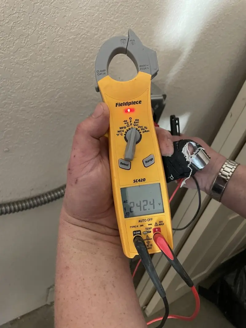 Voltage testing with clamp meter during Generator Installation in Justice